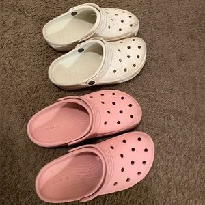 Deal comes with both pairs Crocs.